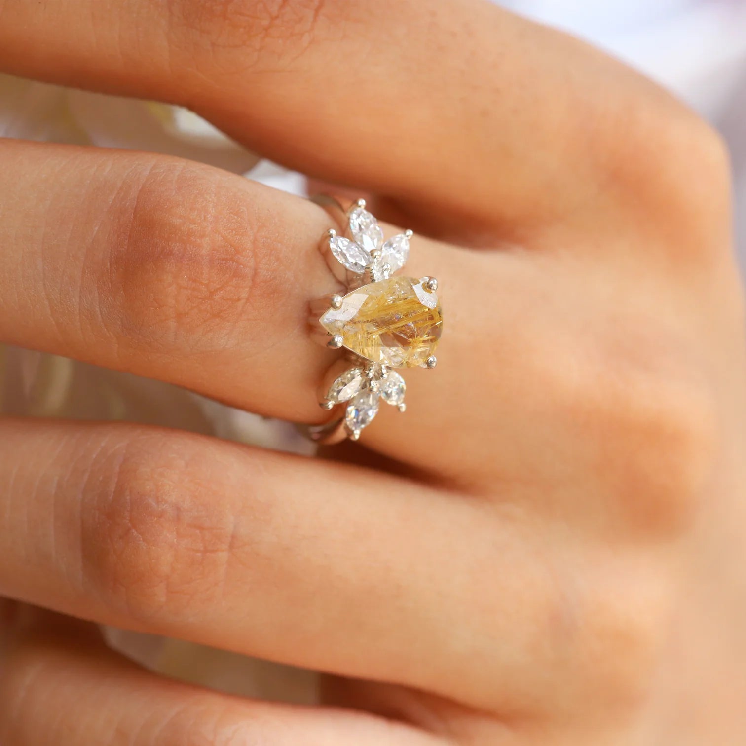 Monica Pear Golden Rutile Quartz Ring with Petal Marquise Moissanites