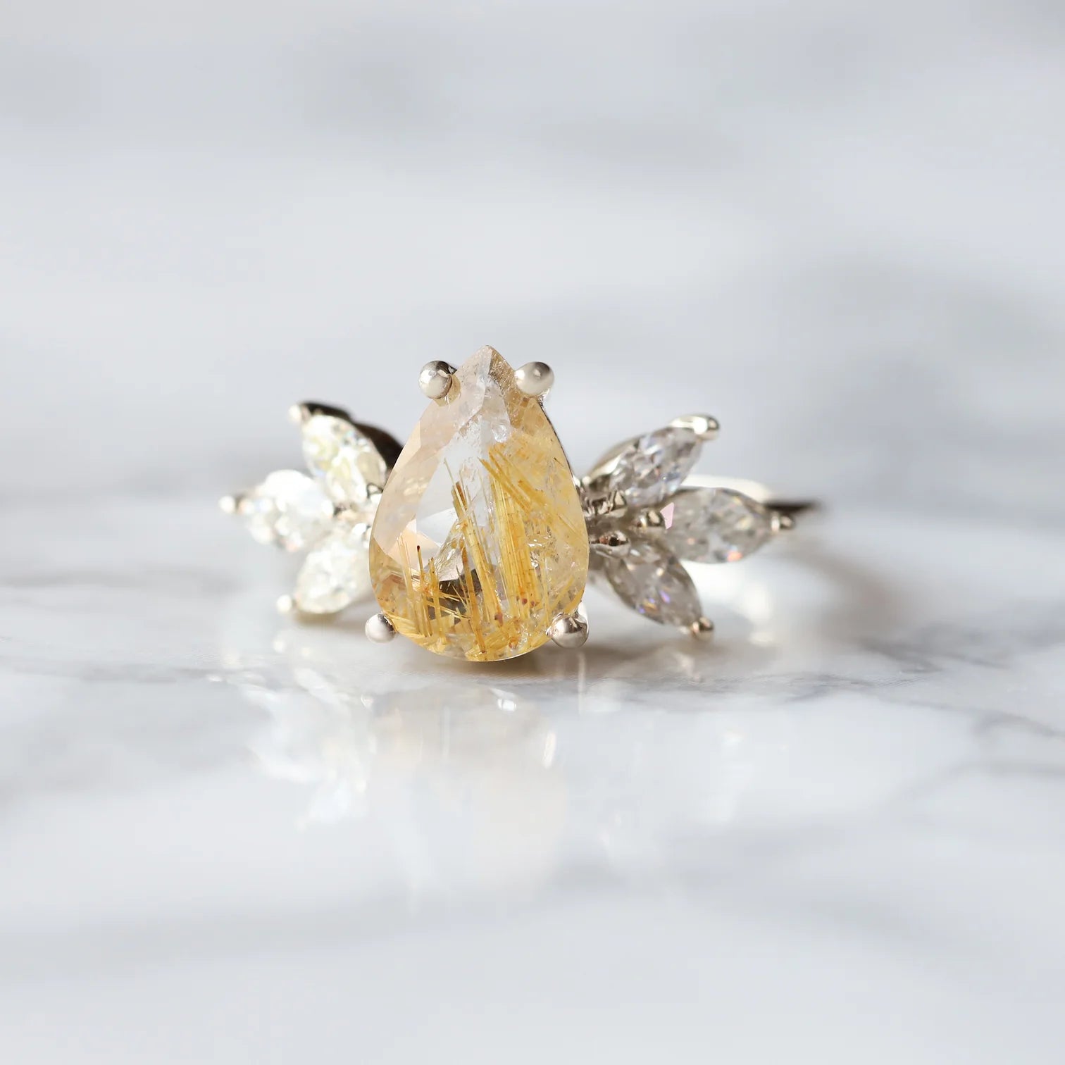 Monica Pear Golden Rutile Quartz Ring with Petal Marquise Moissanites