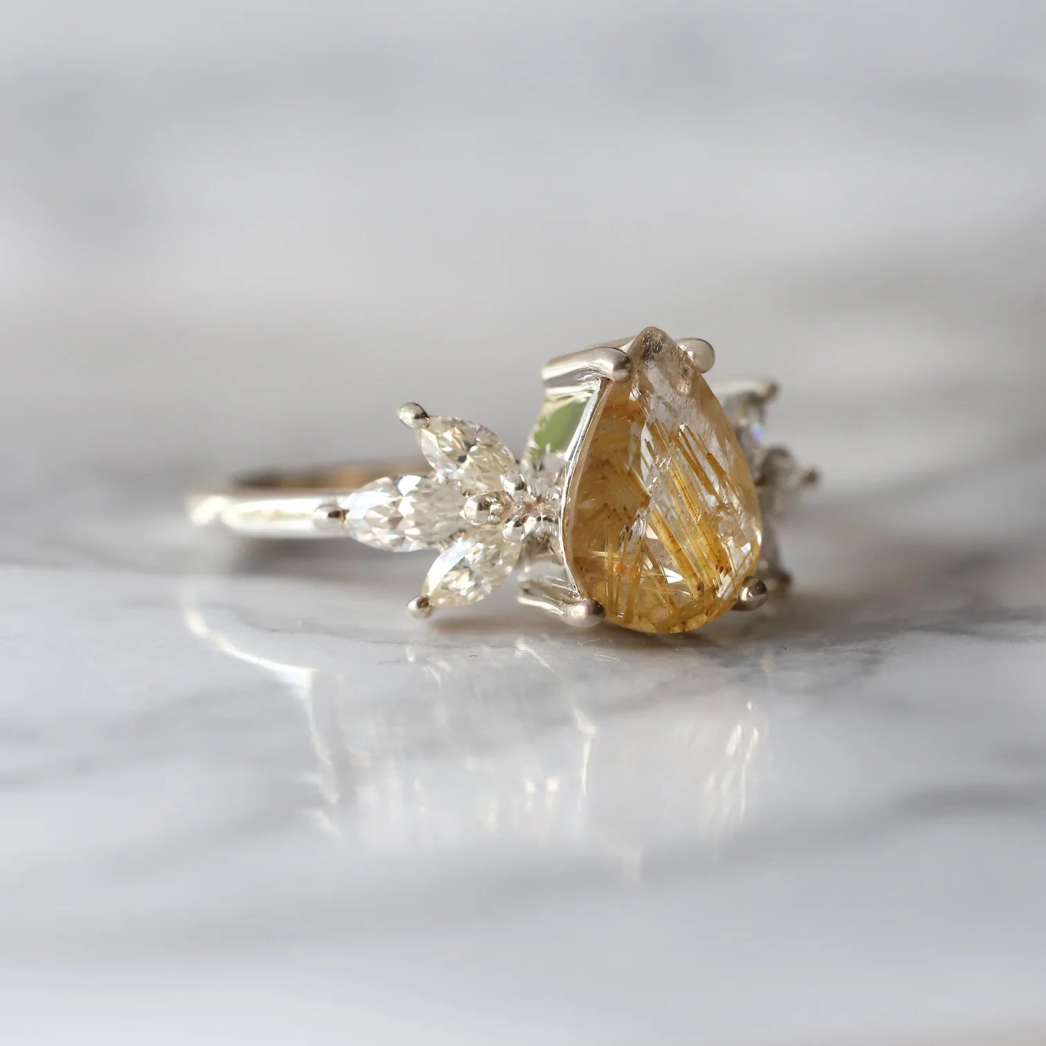 Monica Pear Golden Rutile Quartz Ring with Petal Marquise Moissanites