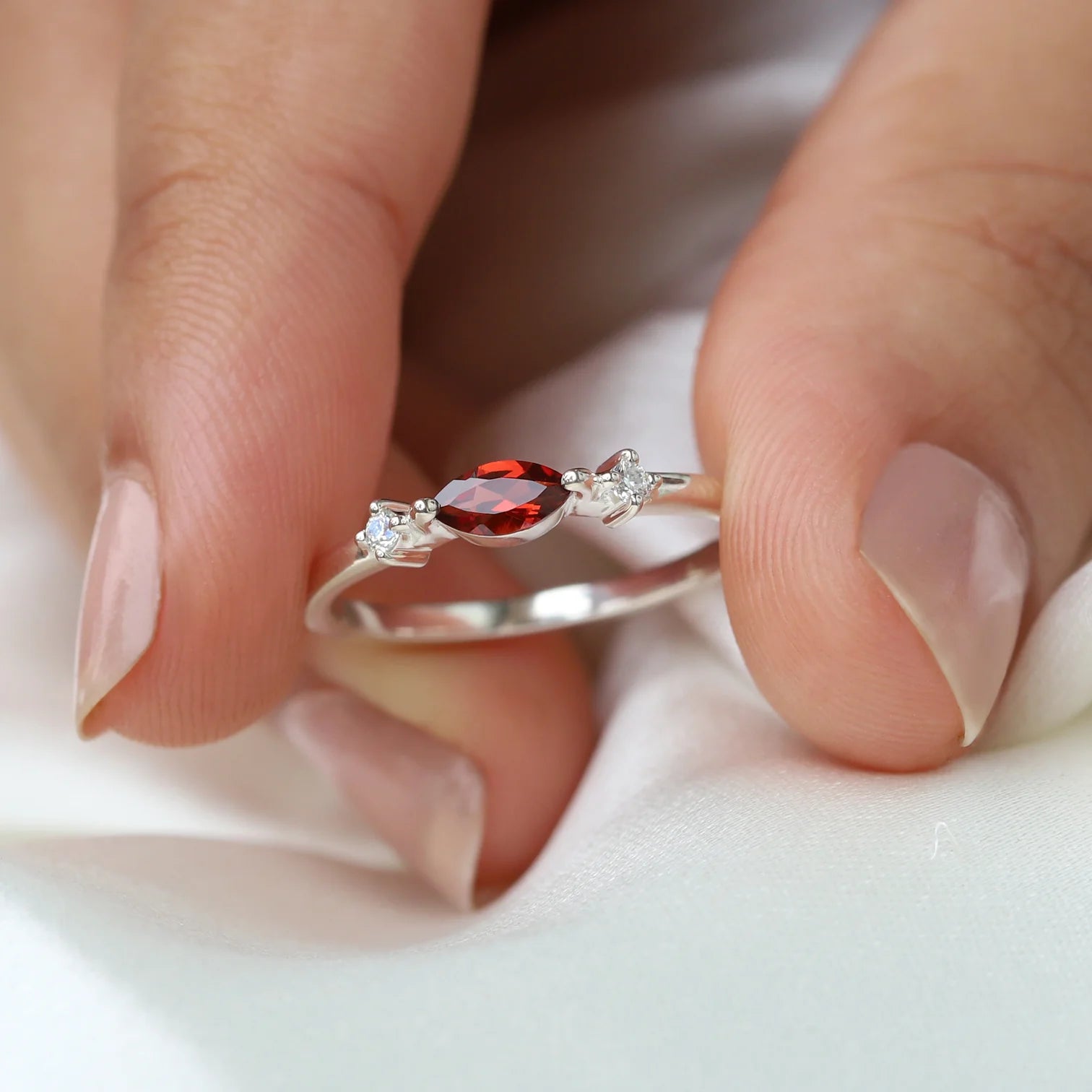 Giotto Garnet Ring with side Moissanites Ring