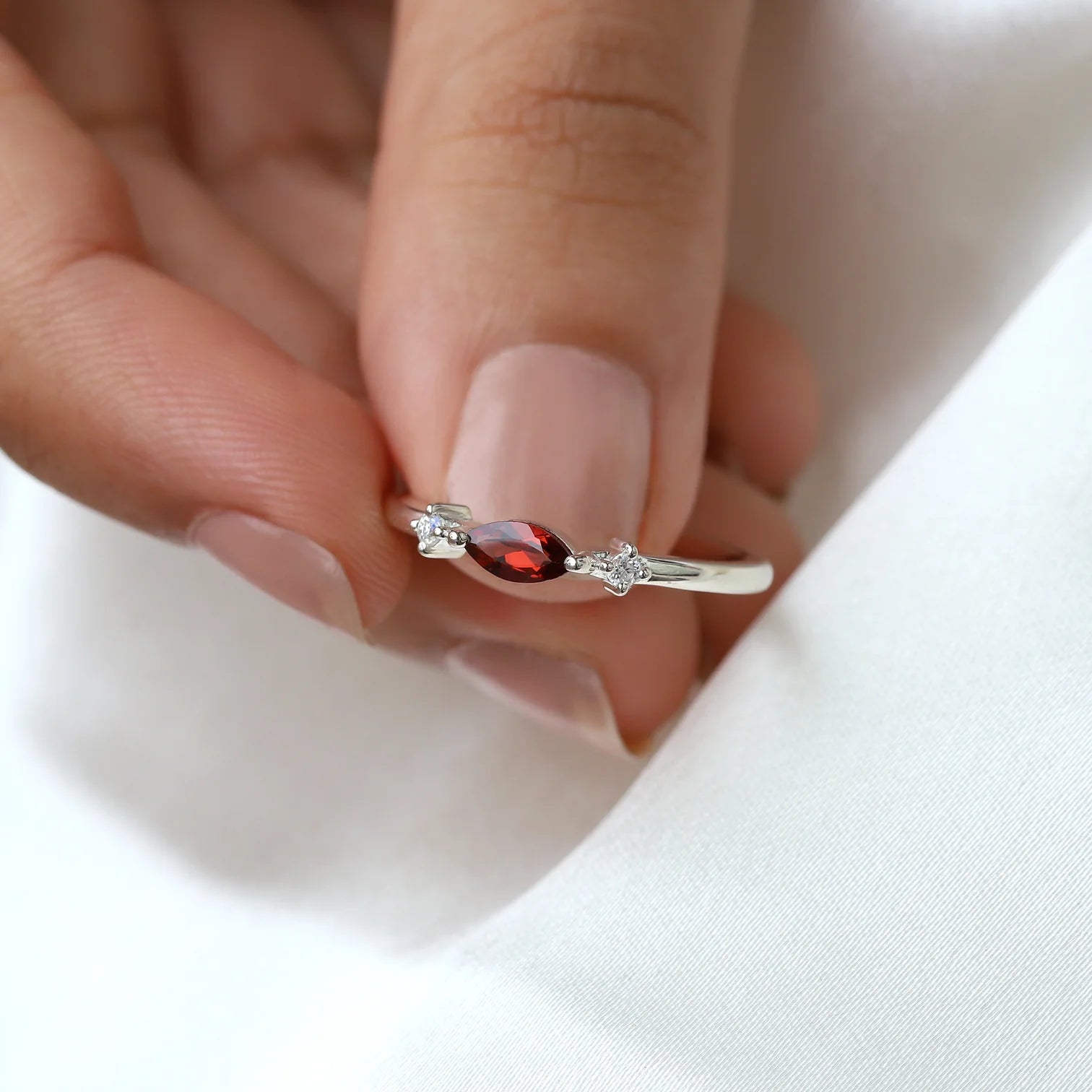 Giotto Garnet Ring with side Moissanites Ring