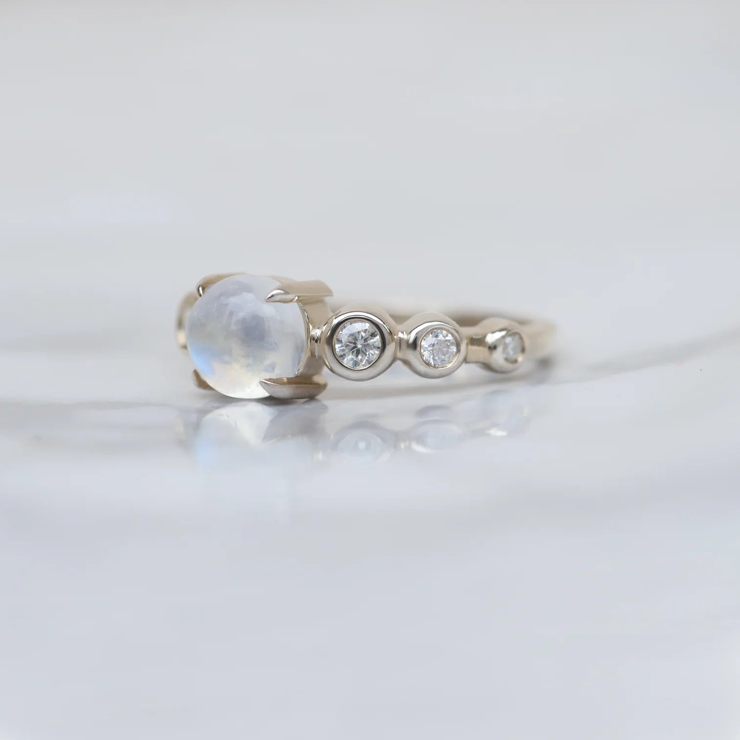 Javier Moonstone with side moissanite Ring