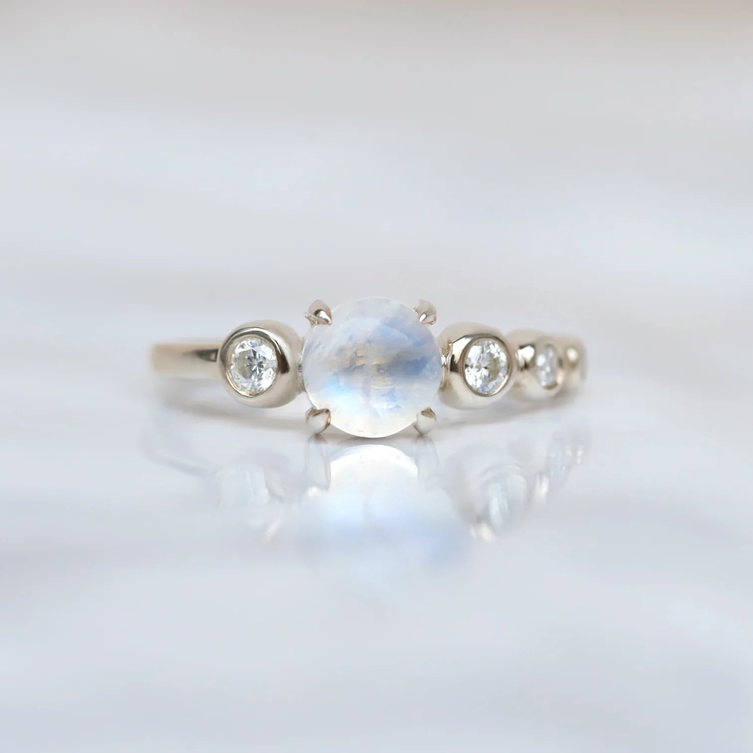 Javier Moonstone with side moissanite Ring