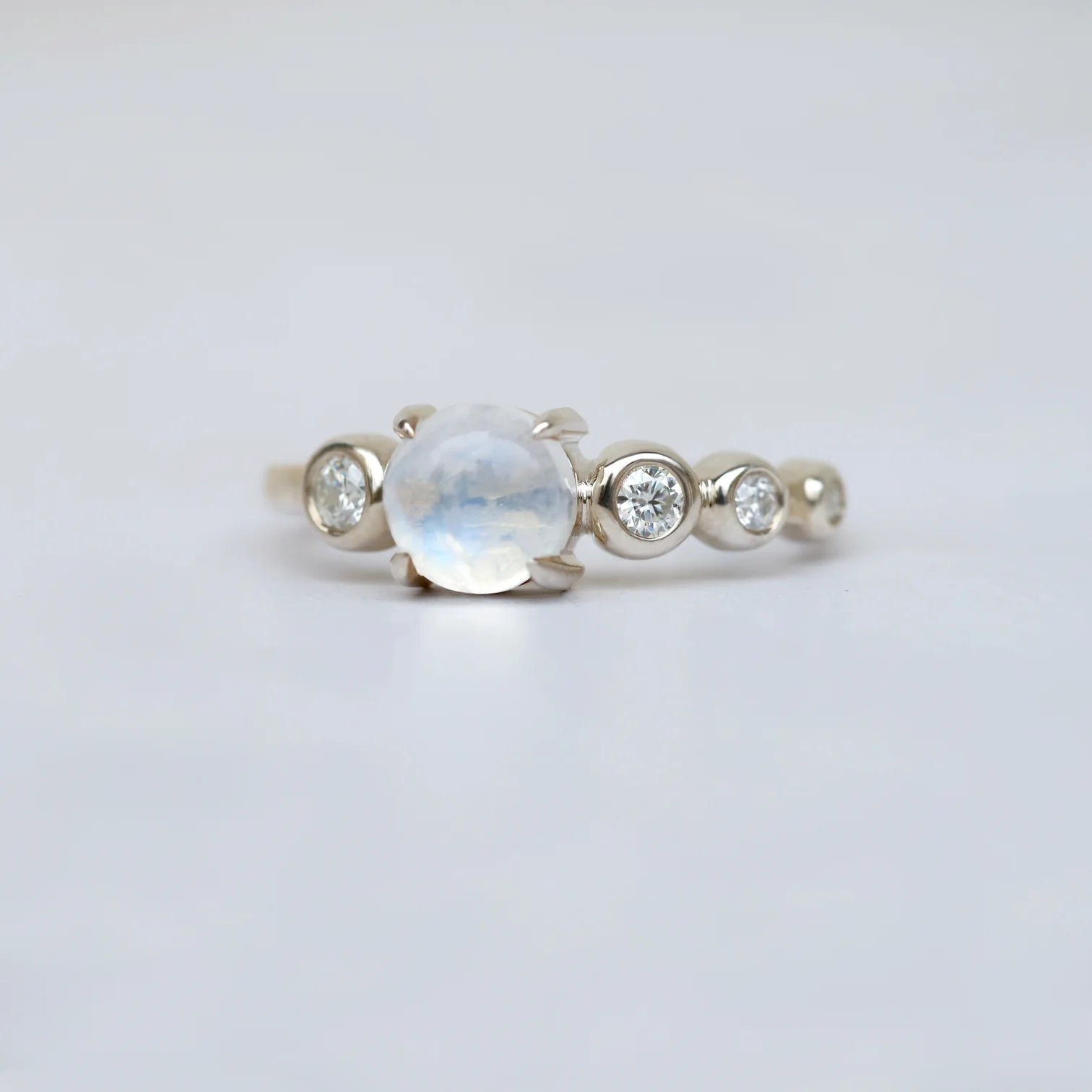 Javier Moonstone with side moissanite Ring