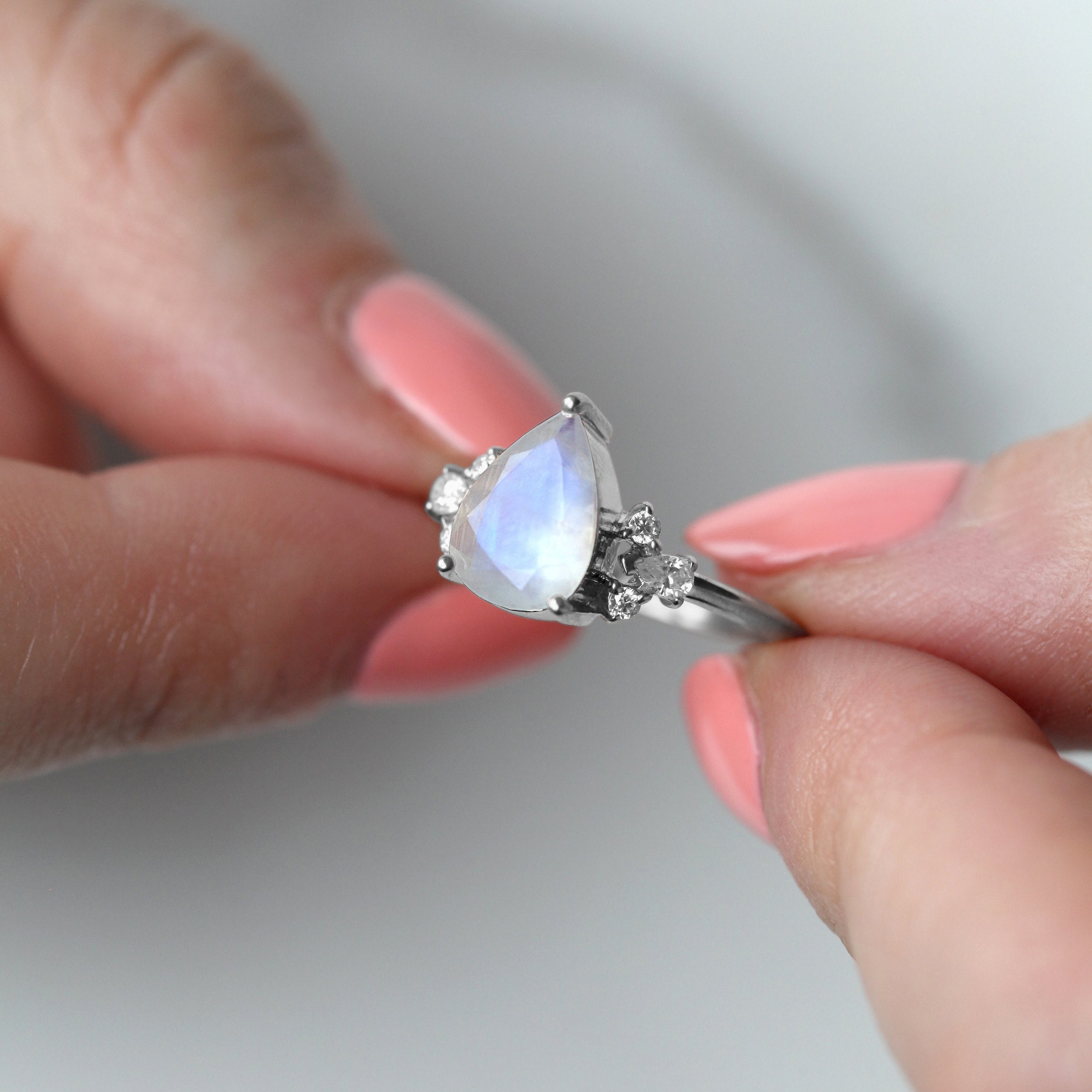 Aretha Pear Moonstone Ring with Round Moissanite