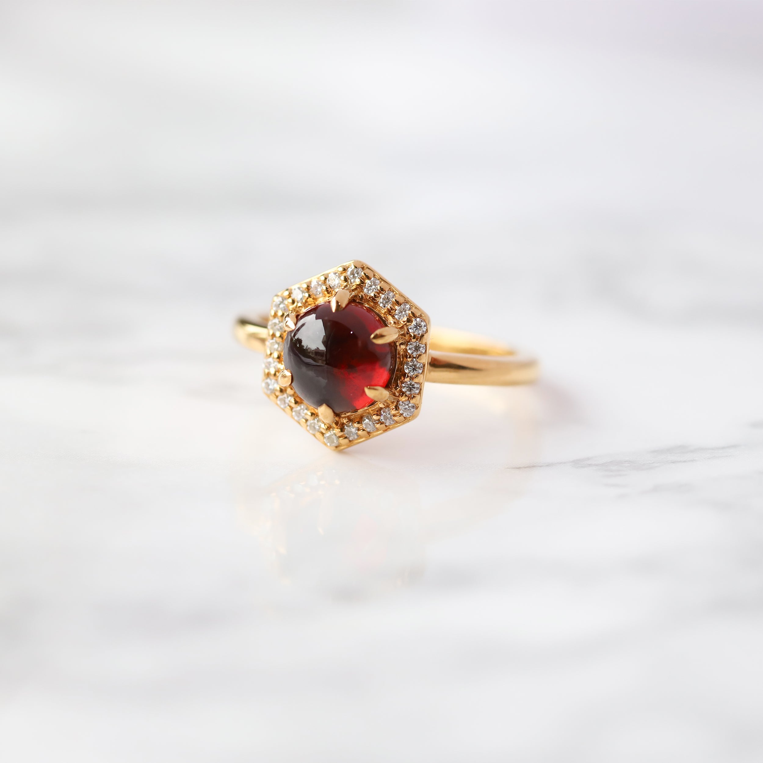 Anine Garnet Cabochon Halo Ring