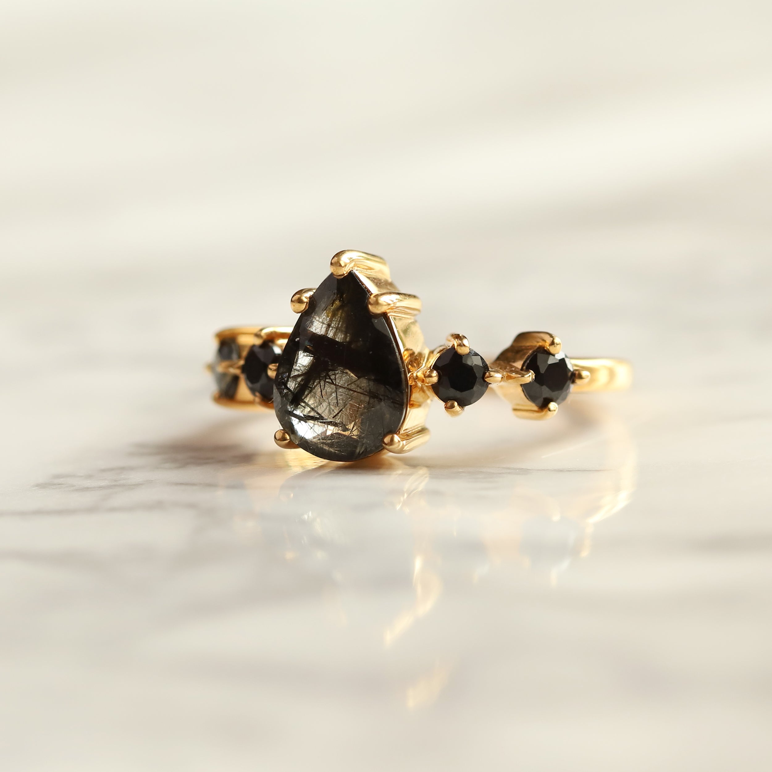 Apollonia Pear Black Rutile Quartz Ring with Round Black Spinel