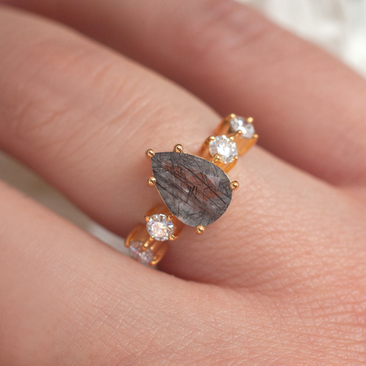 Apollonia Pear Black Rutile Quartz Ring with Round Moissanites