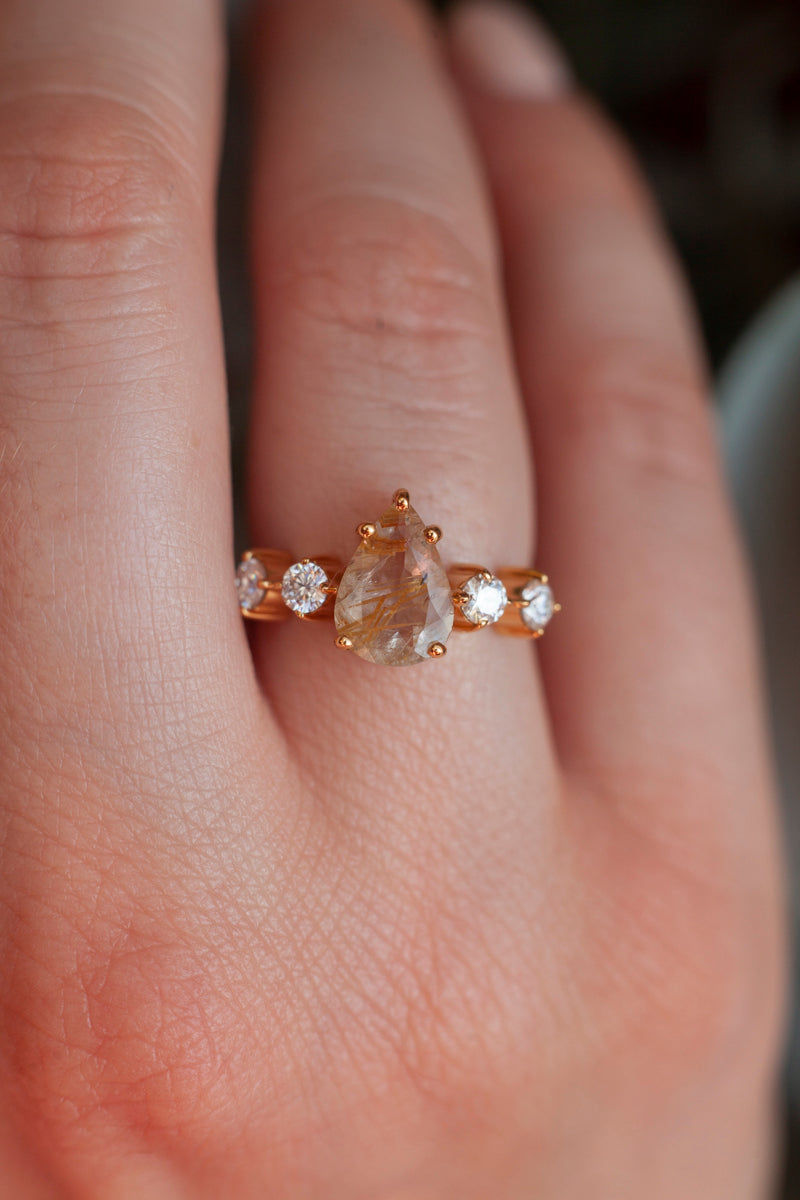 Apollonia Pear Golden Rutile Quartz Ring with Round Moissanite